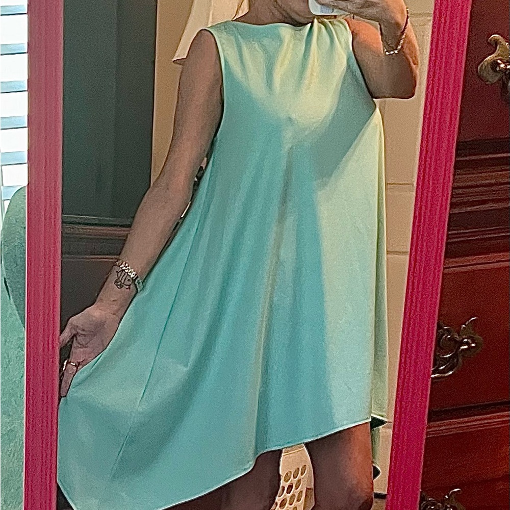 Women’s summer shift dress by Makadamia. Asymmetrical. Aquamarine in color.